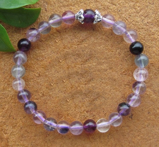 Purple Fluorite 6mm Bead Bracelet with silver colored spacers